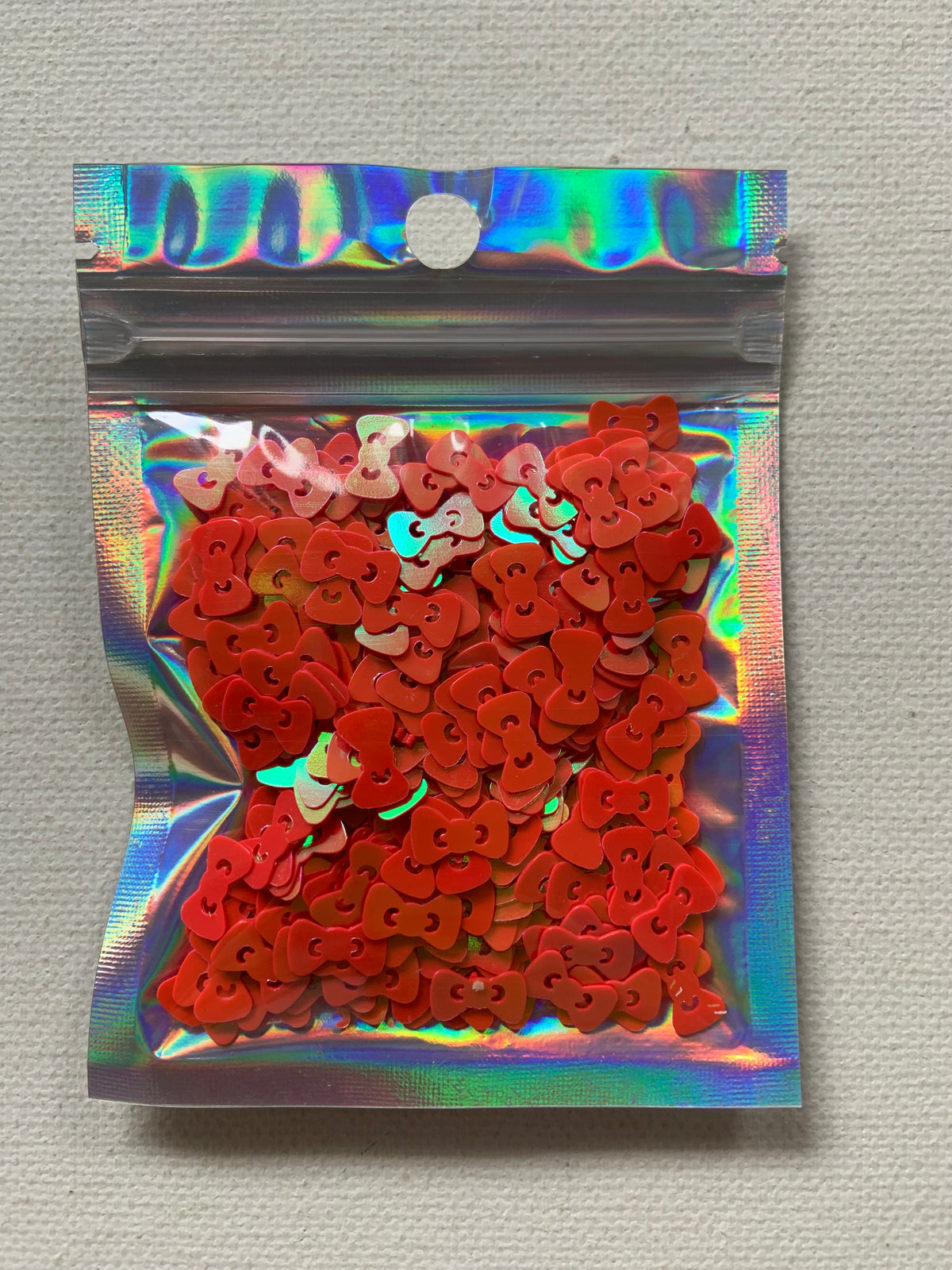 Red Kitty bows shaped glitter, 10 grams