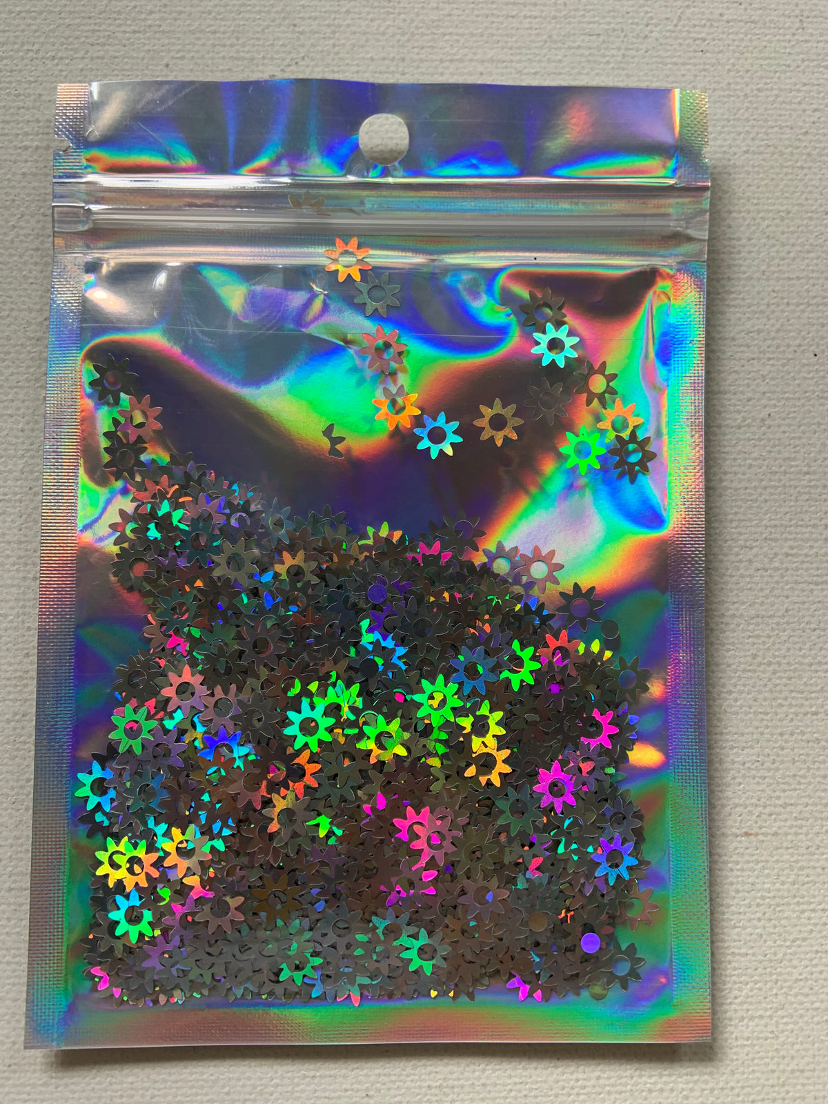 Shaped glitter, silver flowers, 10 grams of products ( without packaging)