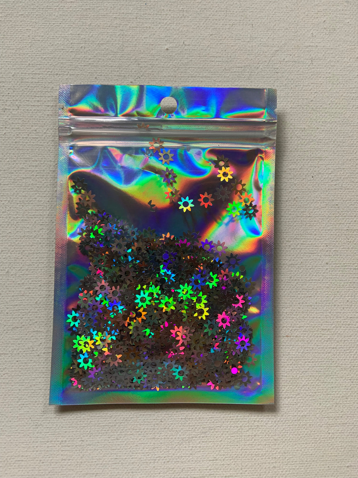 Shaped glitter, silver flowers, 10 grams of products ( without packaging)