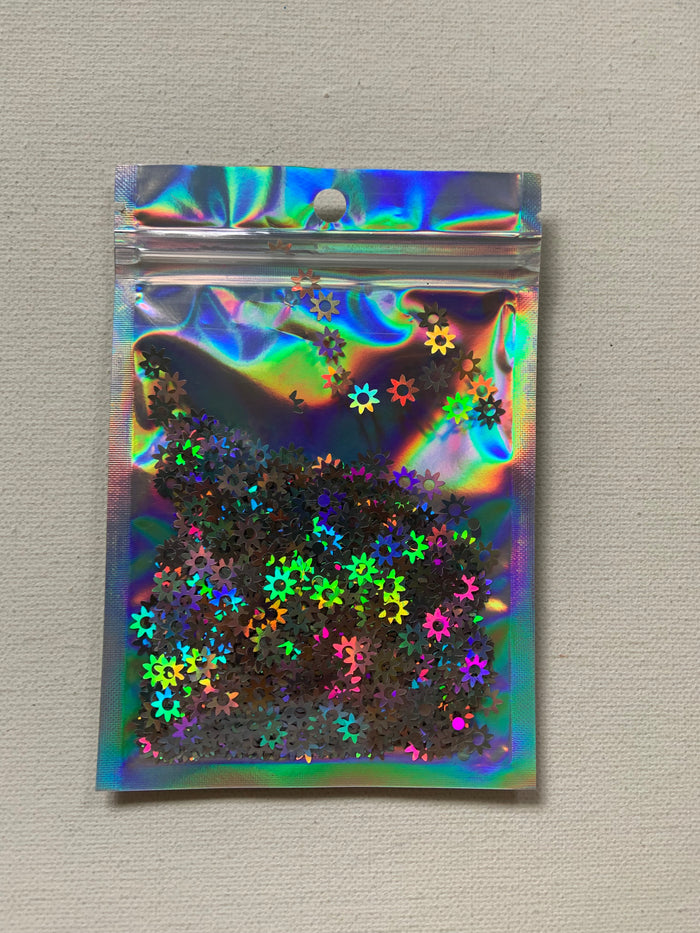 Shaped glitter, silver flowers, 10 grams of products ( without packaging)